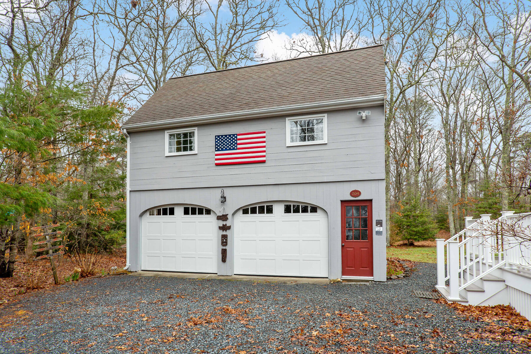 204 Farmersville Road Sandwich, MA 02563 - Photo 16 of 26 a front view of a house with a yard