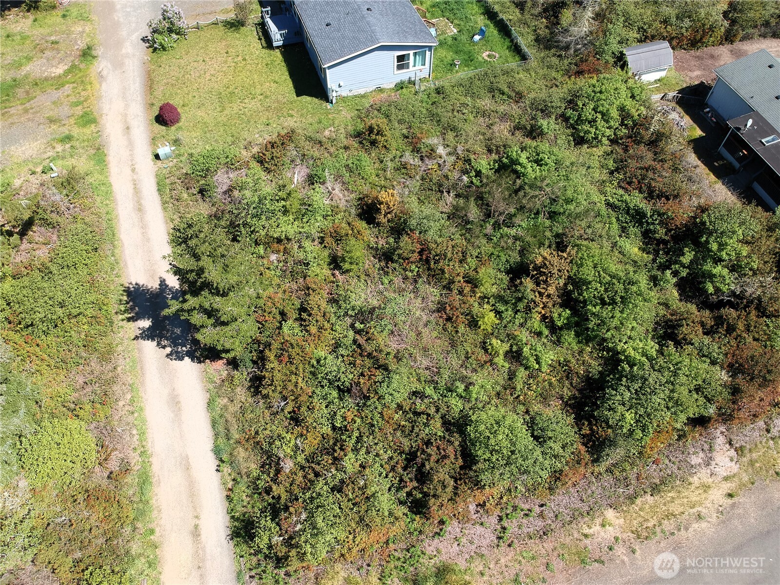 0 219th Street Ocean Park, WA 98640 - Photo 2 of 13 an aerial view of a house with a yard