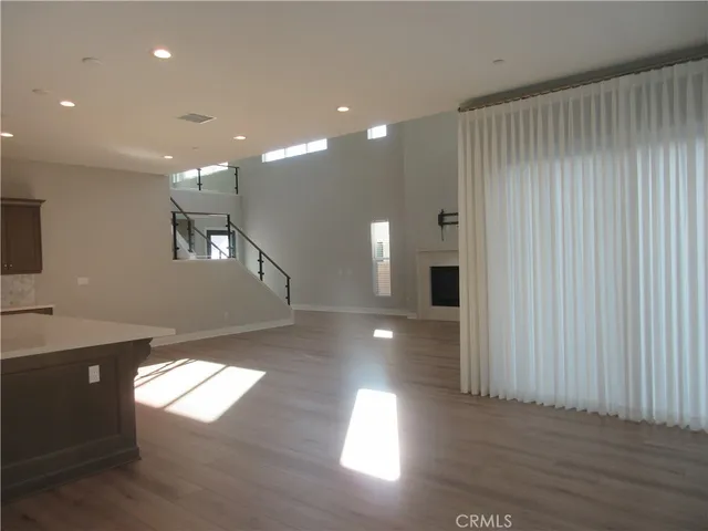 a view of a hallway with windows