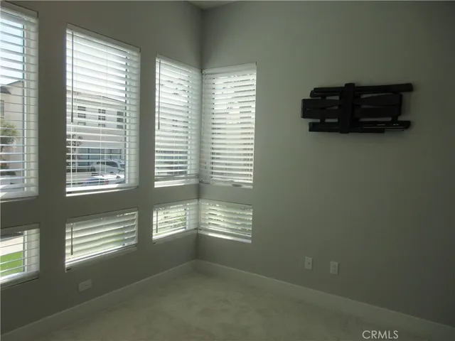 a view of room with window and stairs