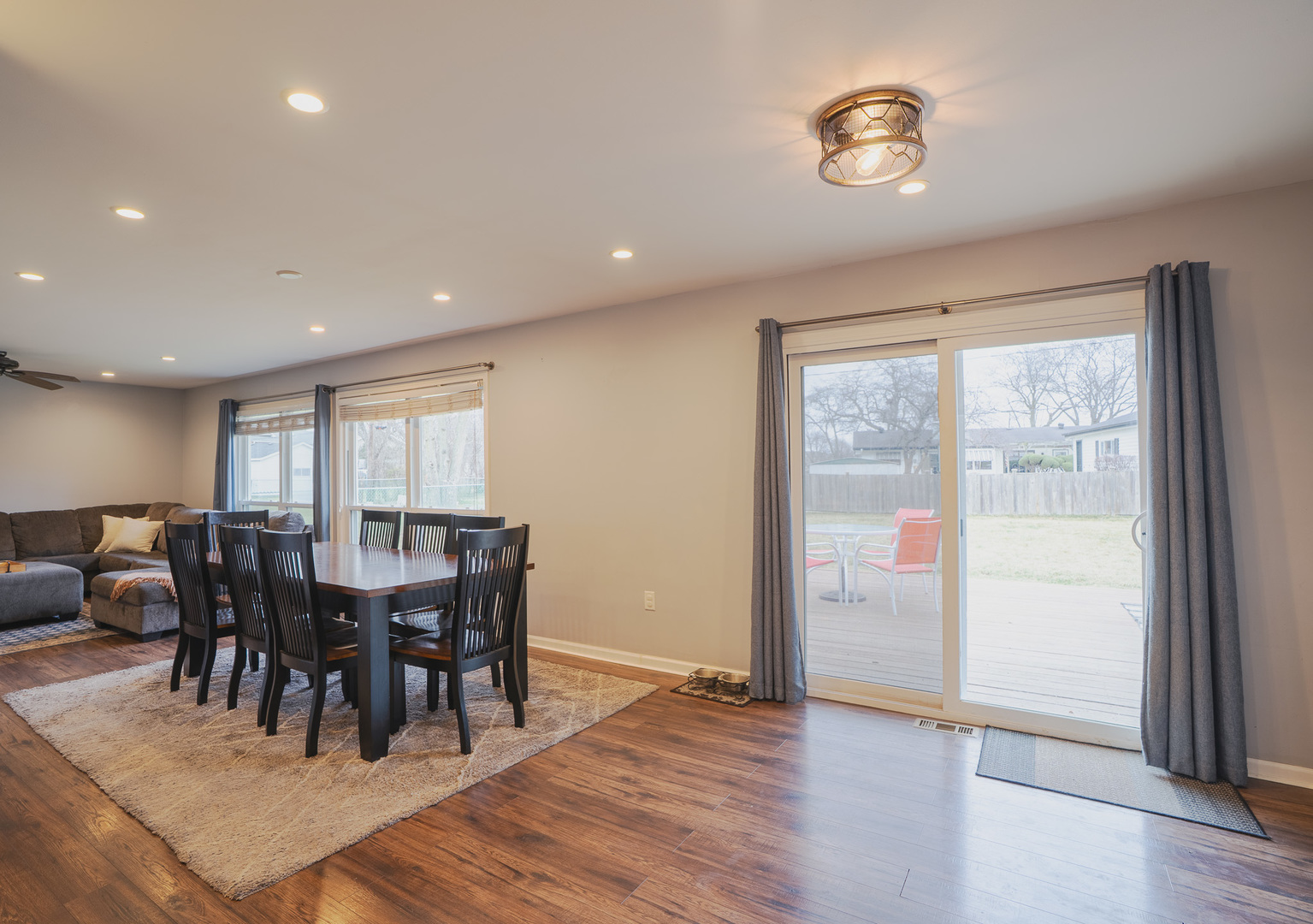 1935 Larchmont Road Hoffman Estates, IL 60169 - Photo 13 of 30 a view of a dining room with furniture window and wooden floor