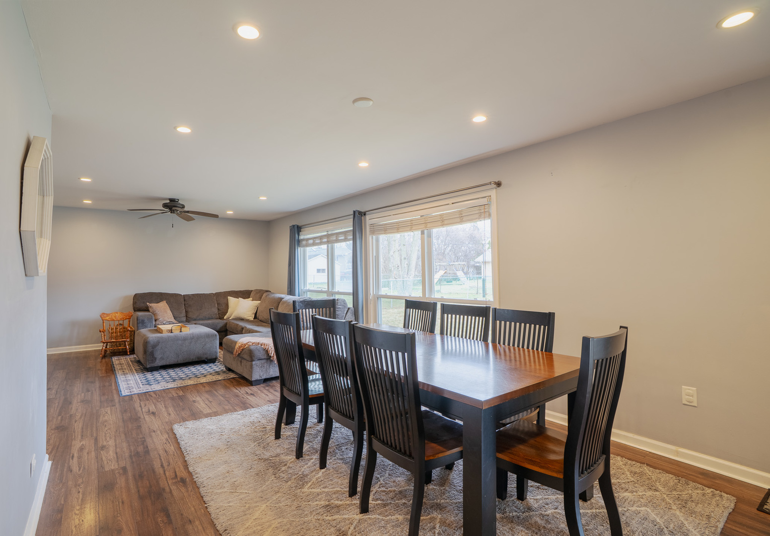 1935 Larchmont Road Hoffman Estates, IL 60169 - Photo 5 of 30 a view of a dining room with furniture and wooden floor