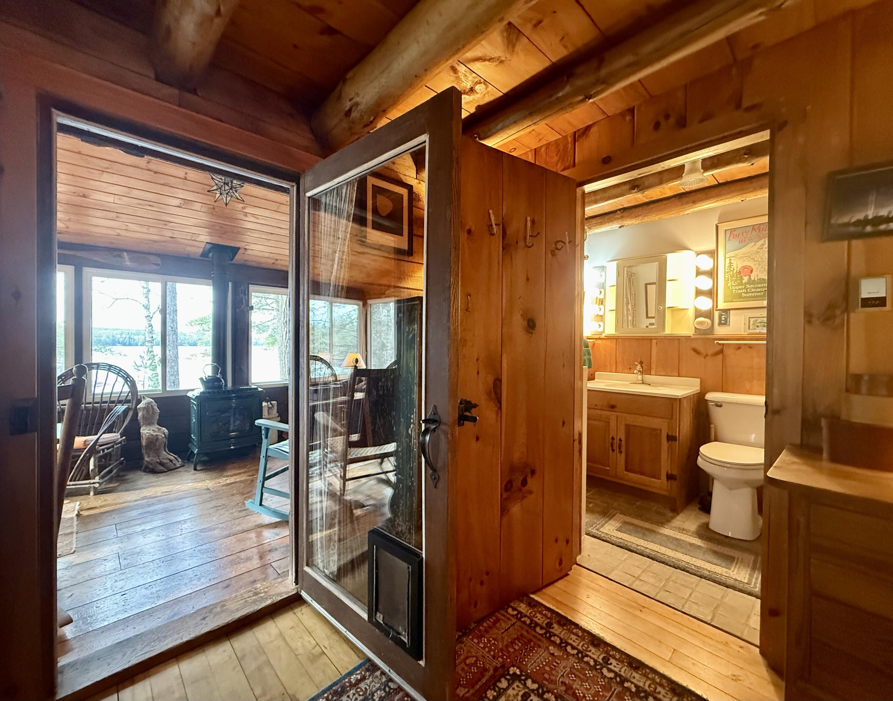 8 Cove Road Princeton, ME 04668 - Photo 36 of 77 Views of Sun porch from bedroom