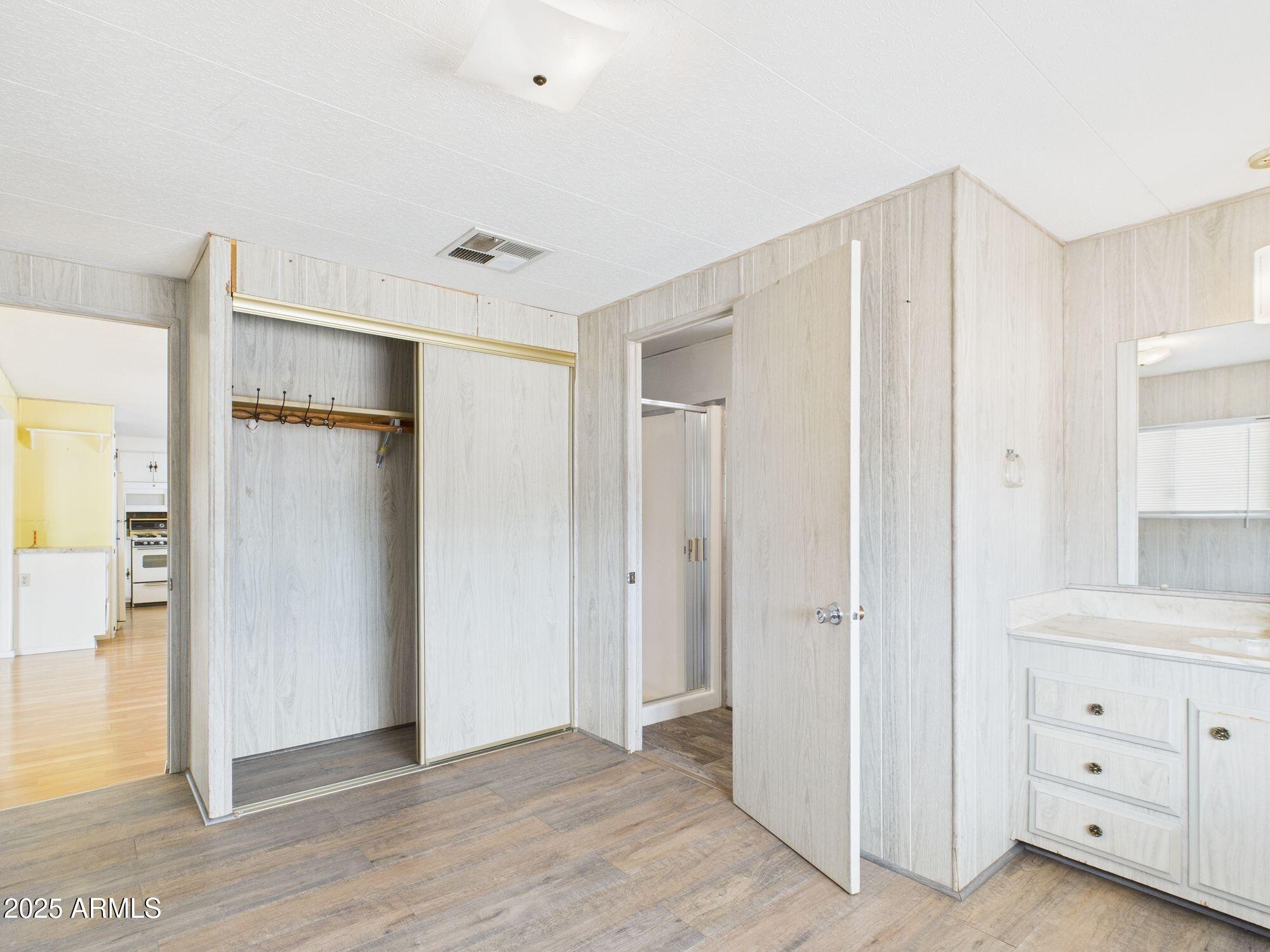 428 South 80th Way Mesa, AZ 85208 - Photo 16 of 21 a view of a hallway with closet area
