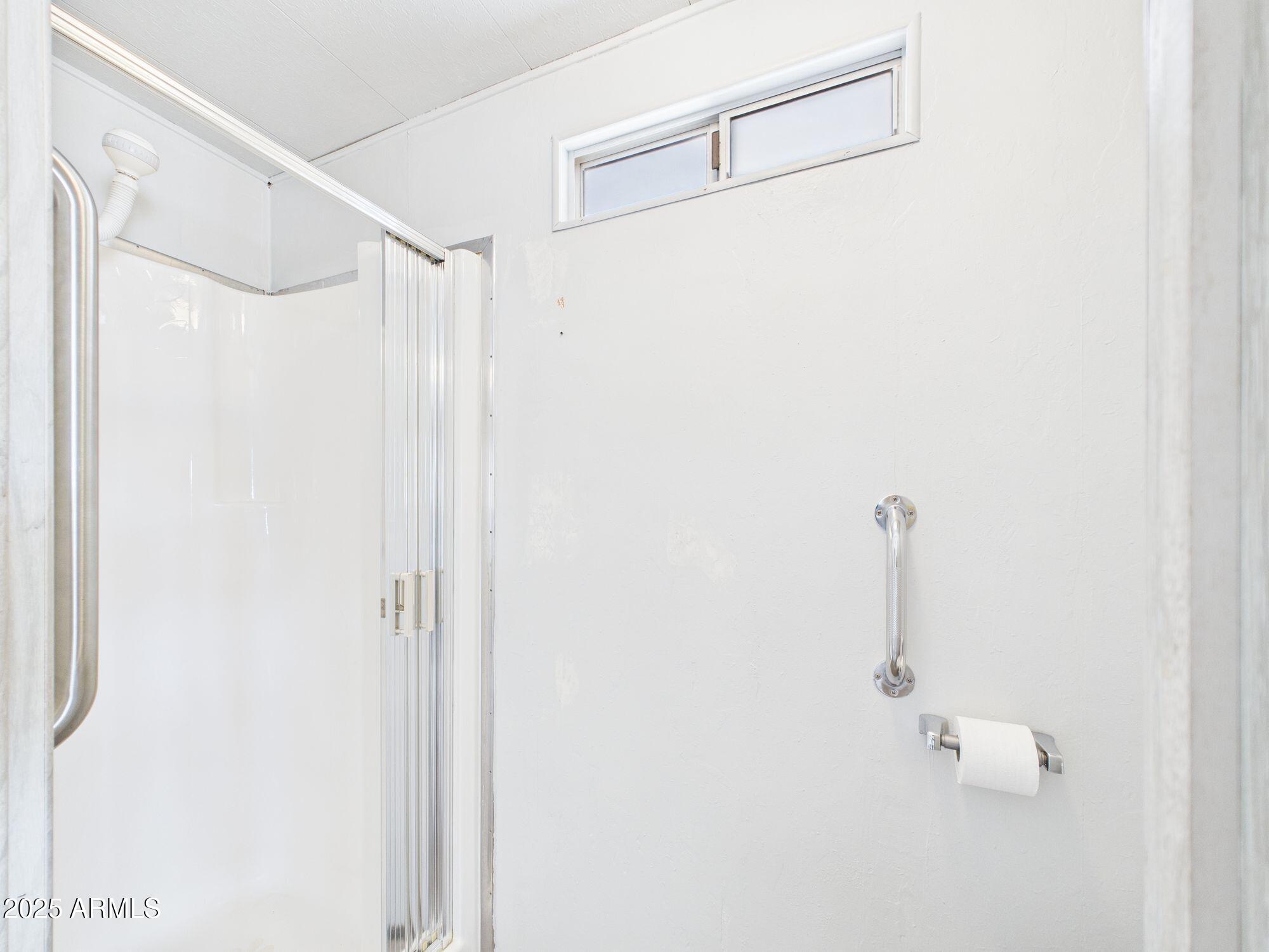 428 South 80th Way Mesa, AZ 85208 - Photo 17 of 21 a bathroom with a shower and a shower