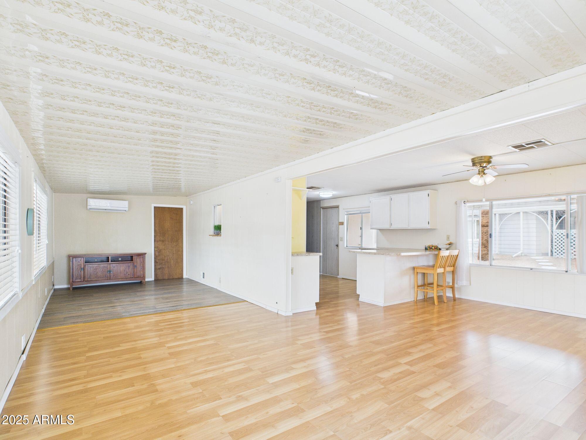 428 South 80th Way Mesa, AZ 85208 - Photo 4 of 21 a view of a kitchen with a sink and cabinets