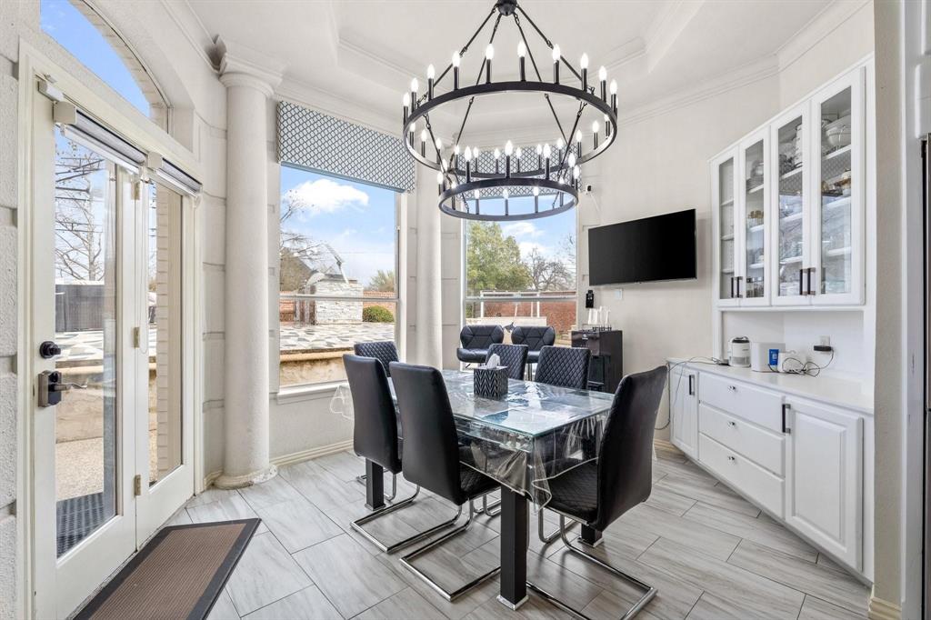 200 Mill Crossing West Colleyville, TX 76034 - Photo 14 of 40 a view of a dining room with furniture window and wooden floor