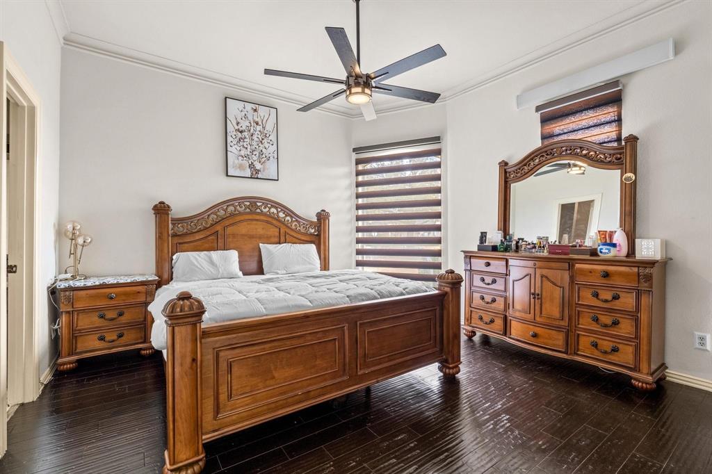 200 Mill Crossing West Colleyville, TX 76034 - Photo 19 of 40 a bedroom with a bed and a dresser