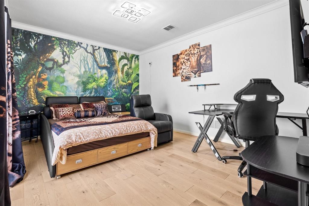 200 Mill Crossing West Colleyville, TX 76034 - Photo 27 of 40 a bed room with a bed window and a chair