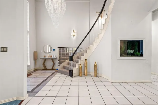 a living room with chairs