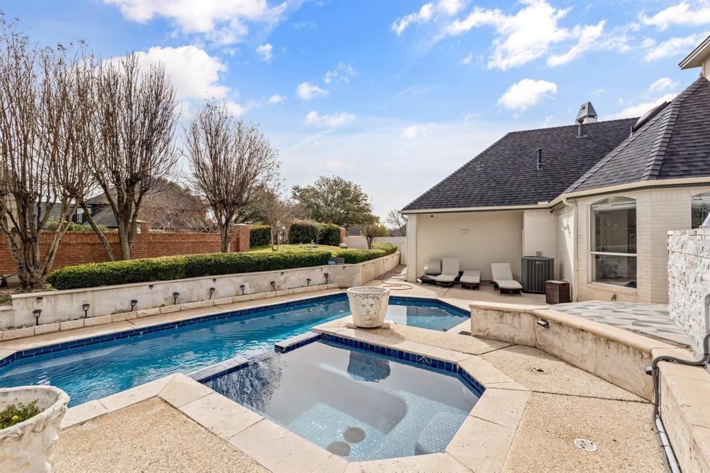 200 Mill Crossing West Colleyville, TX 76034 - Photo 36 of 40 a living room with furniture and a flat screen tv