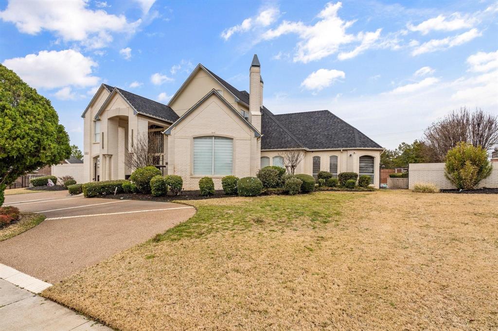 200 Mill Crossing West Colleyville, TX 76034 - Photo 40 of 40 a front view of a house with a yard and garage