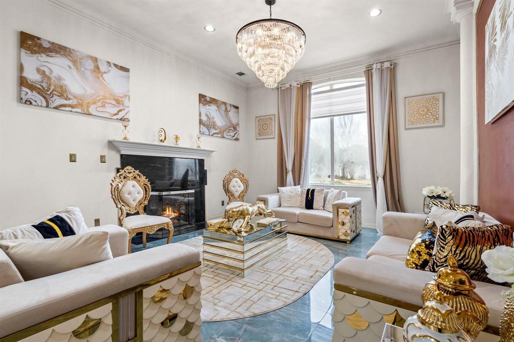 200 Mill Crossing West Colleyville, TX 76034 - Photo 4 of 40 a living room with furniture chandelier and a large window