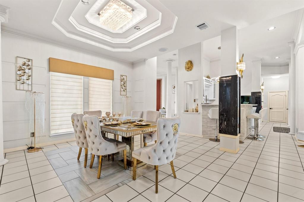 200 Mill Crossing West Colleyville, TX 76034 - Photo 10 of 40 a view of a dining room with furniture and a large window