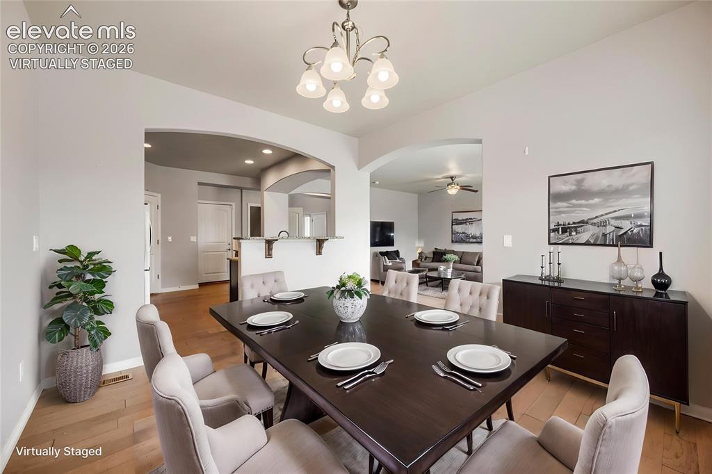 10202 Boulder Ridge Drive Peyton, CO 80831 - Photo 10 of 40 Virtually Staged Dining Room