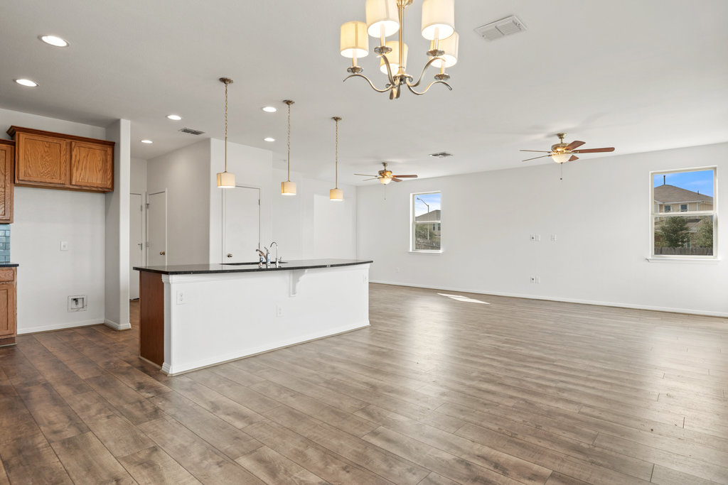 117 Wapiti Road Buda, TX 78610 - Photo 35 of 35 a view of a kitchen with marble kitchen and stainless steel appliances