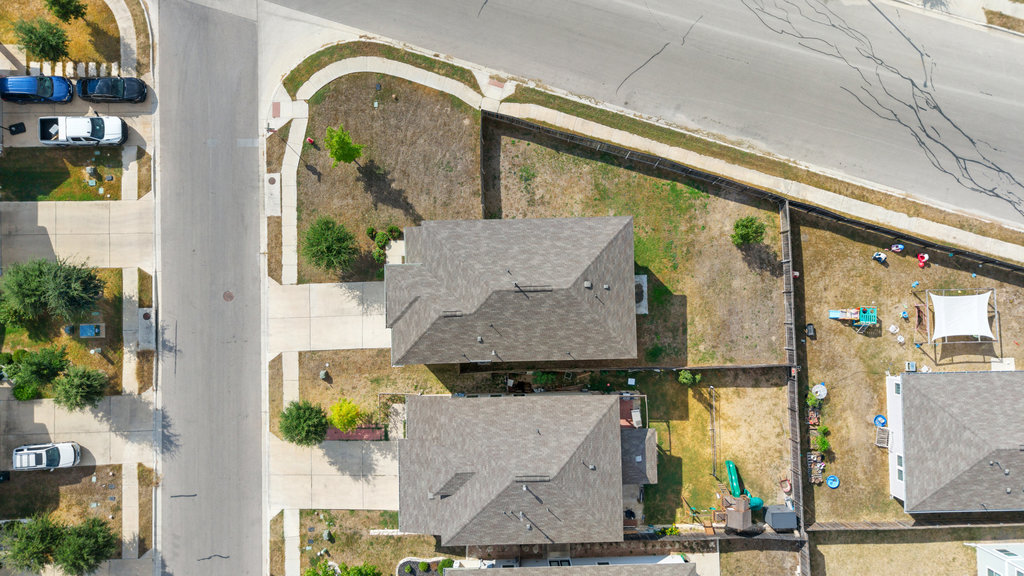 117 Wapiti Road Buda, TX 78610 - Photo 27 of 35 an aerial view of residential houses with outdoor space