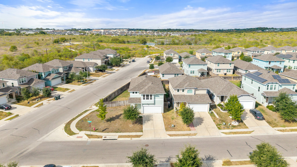 117 Wapiti Road Buda, TX 78610 - Photo 4 of 35 a view of a city with an ocean view