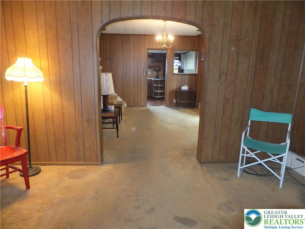 7 North 4th Street Coplay, PA 18037 - Photo 4 of 23 a view of a room that has a bed and a chandelier