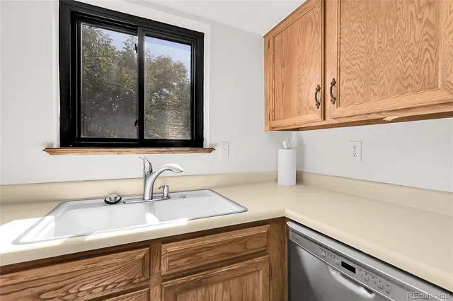a view of a sink and mirror