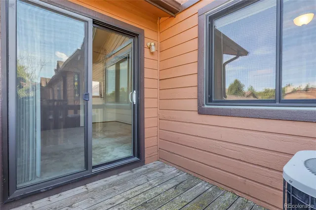 a bathroom with a sink toilet and a mirror