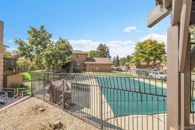 an aerial view of a house with a garden