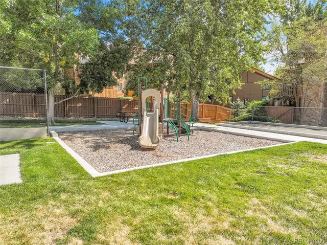 an aerial view of a house with a garden