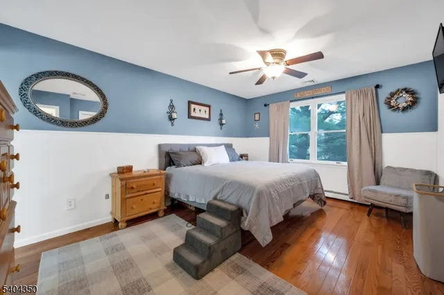 a bed room with a bed and a window