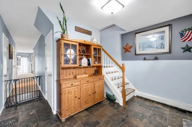 a view of an entryway with staircase