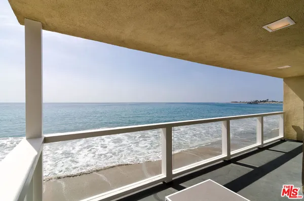 a view of balcony with ocean view