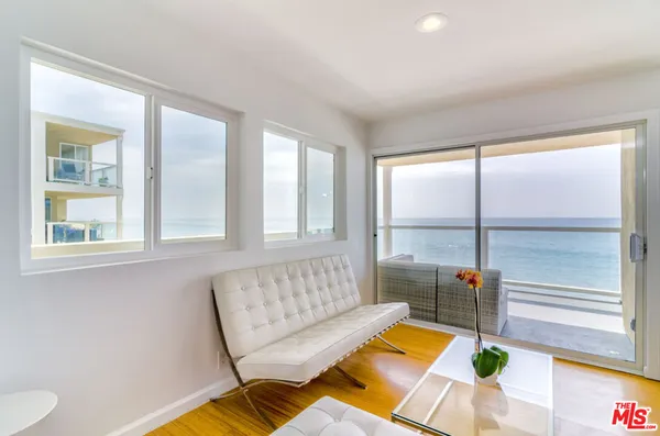 a living room with a couch and a table