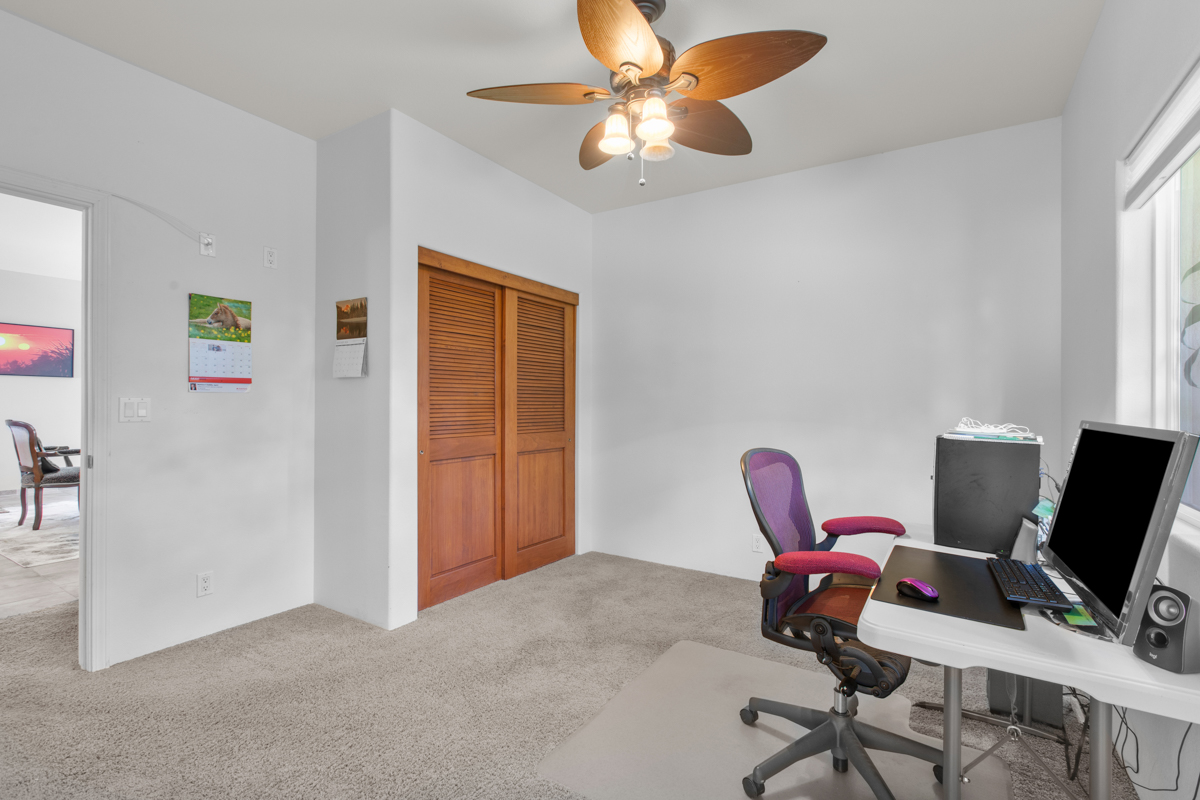 73-4571 Kukuki Street, Unit A Kailua-Kona, HI 96740 - Photo 18 of 30 a view of a workspace with furniture and a window