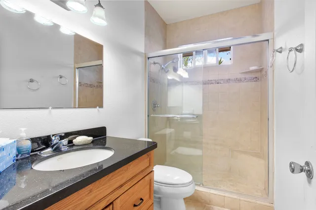 a bathroom with a sink a toilet and a bathtub