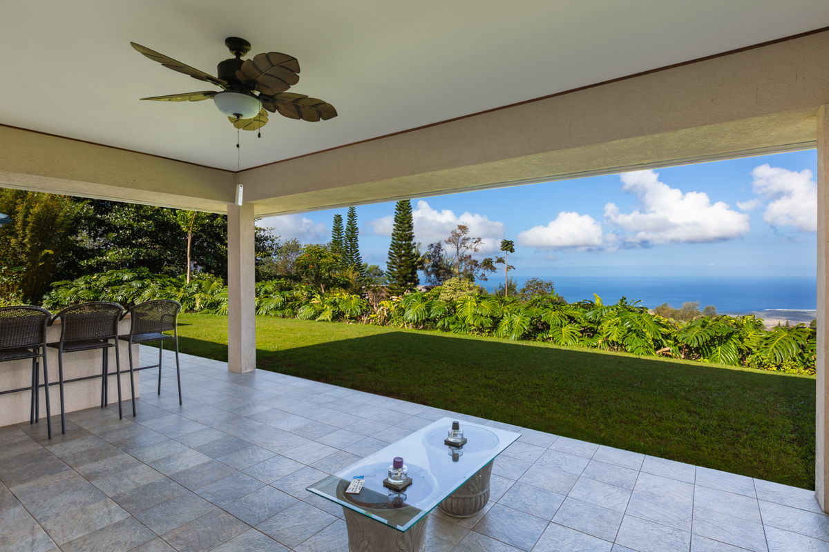 73-4571 Kukuki Street, Unit A Kailua-Kona, HI 96740 - Photo 2 of 30 a view of a porch and garden