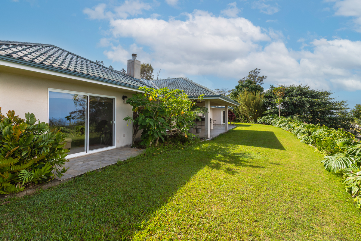 73-4571 Kukuki Street, Unit A Kailua-Kona, HI 96740 - Photo 28 of 30 a view of a house with a swimming pool