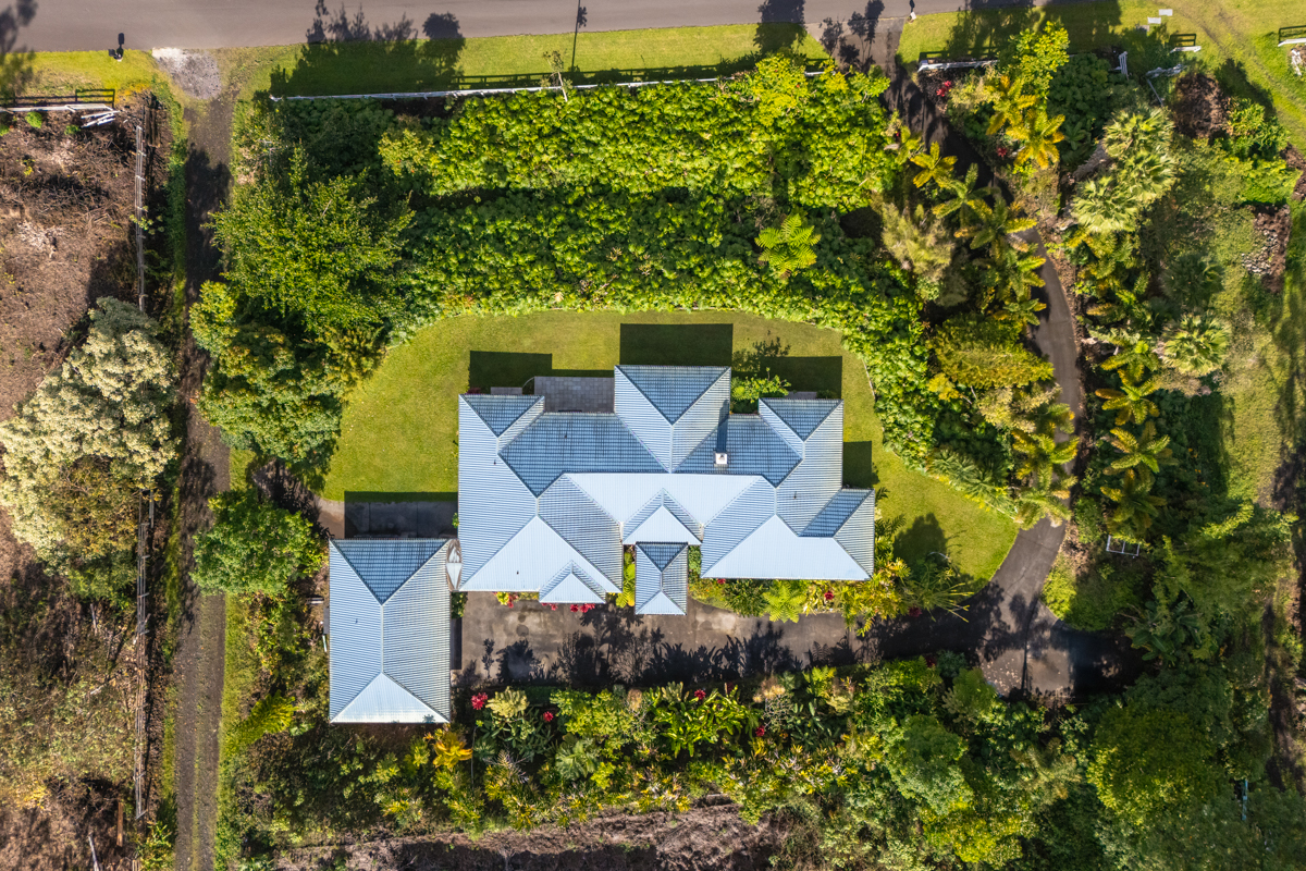 73-4571 Kukuki Street, Unit A Kailua-Kona, HI 96740 - Photo 30 of 30 an aerial view of a house with a garden