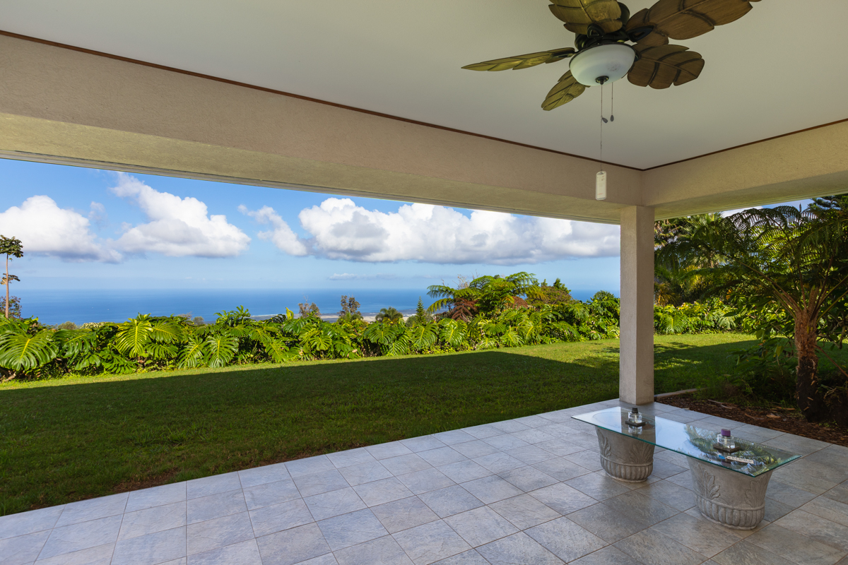 73-4571 Kukuki Street, Unit A Kailua-Kona, HI 96740 - Photo 3 of 30 a view of a porch with a yard