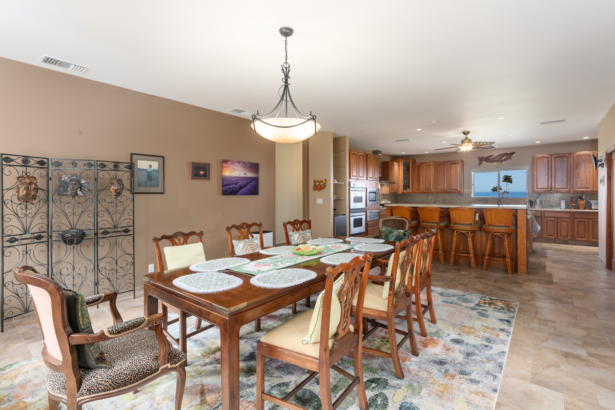 73-4571 Kukuki Street, Unit A Kailua-Kona, HI 96740 - Photo 7 of 30 a view of a dining room with furniture
