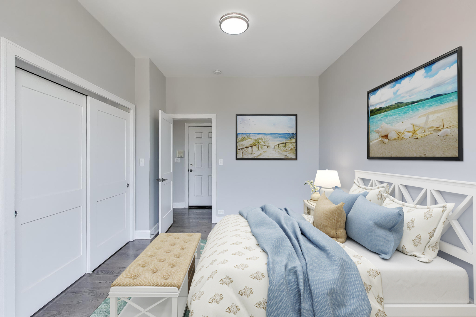 313 East 60th Street, Unit 4 Chicago, IL 60637 - Photo 40 of 42 a bedroom with a bed and a painting on the wall