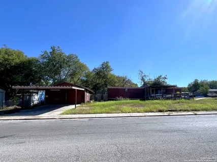 a view of swimming pool and a yard
