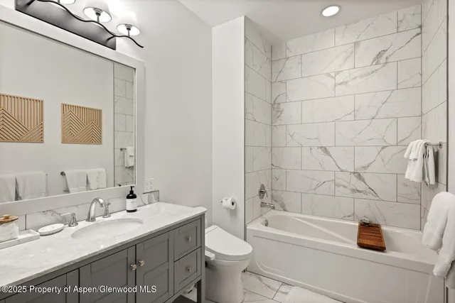 a view of a storage & utility room with washer and dryer