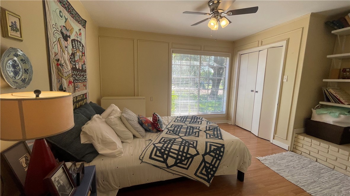 704 Colorado Street Bremond, TX 76629 - Photo 18 of 42 a bedroom with a bed and a couch