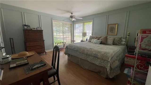 a bedroom with a bed and furniture