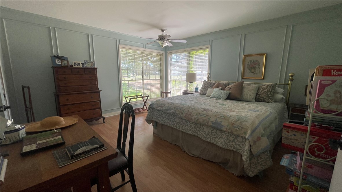 704 Colorado Street Bremond, TX 76629 - Photo 19 of 42 a bedroom with a bed and furniture