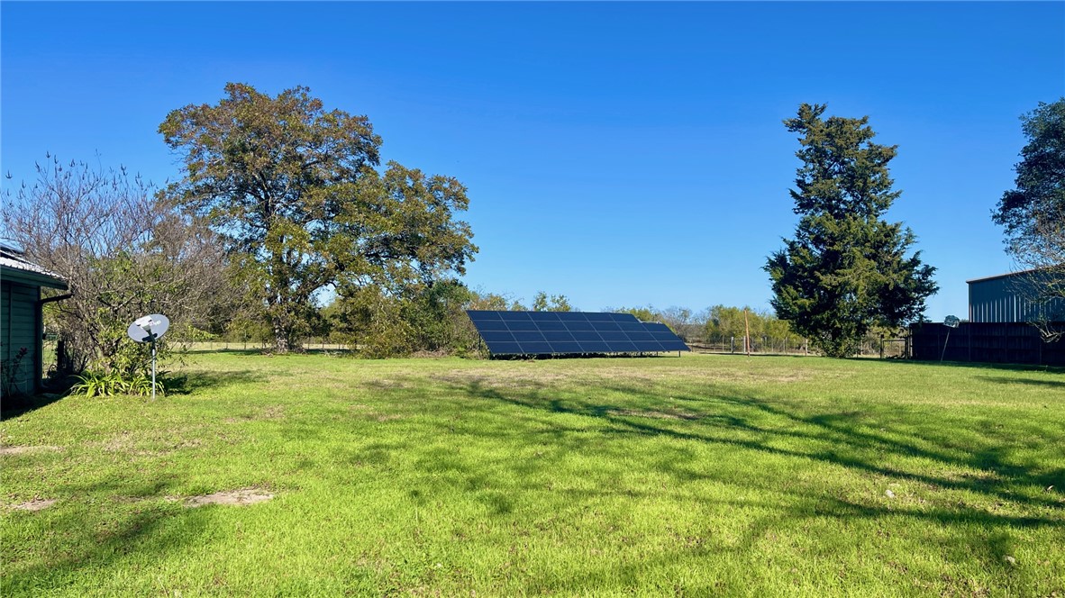 704 Colorado Street Bremond, TX 76629 - Photo 30 of 42 a yard with trees in the background