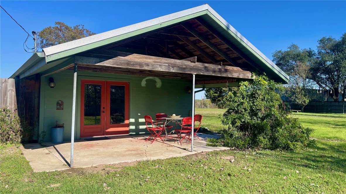 704 Colorado Street Bremond, TX 76629 - Photo 33 of 42 a view of house with backyard outdoor seating and hardwood