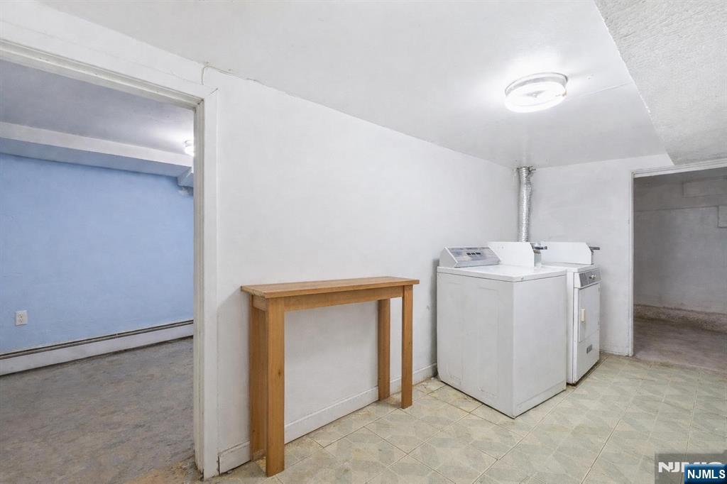 509 Monastery Place Union City, NJ 07087 - Photo 35 of 49 a utility room with a washer and dryer