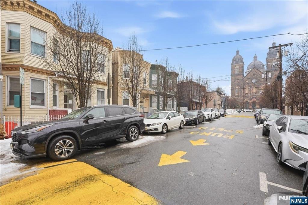 509 Monastery Place Union City, NJ 07087 - Photo 44 of 49 a view of a city street with a car parked on the road