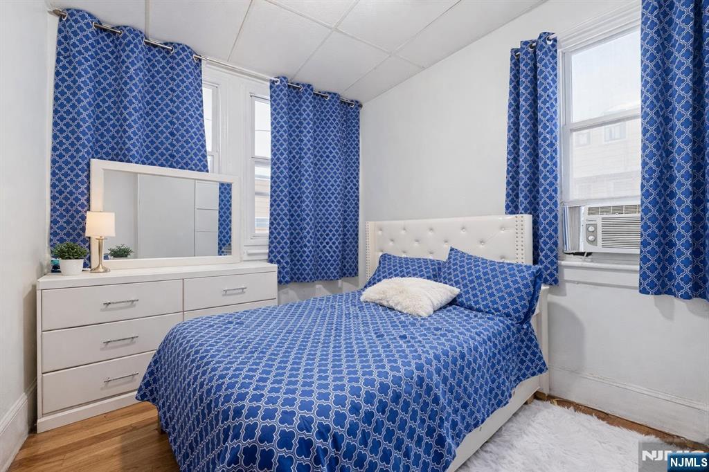509 Monastery Place Union City, NJ 07087 - Photo 10 of 49 a bedroom with a bed and a window