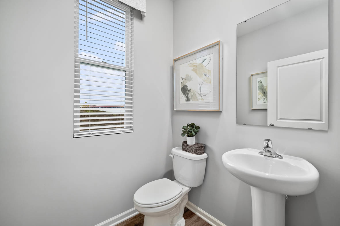 2652 Camelback Drive Pingree Grove, IL 60140 - Photo 13 of 42 a bathroom with a sink mirror and toilet